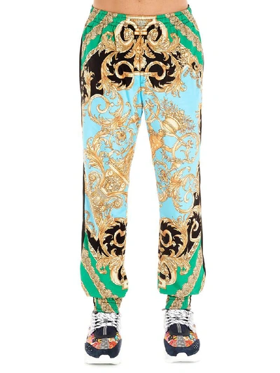 Shop Versace Baroque Print Pants In Multi
