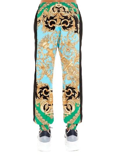 Shop Versace Baroque Print Pants In Multi