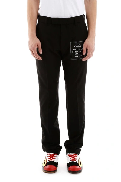 Shop Palm Angels Logo Patch Pants In Black