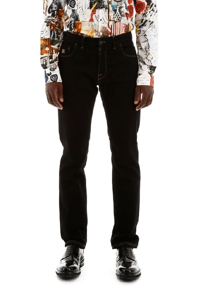 Shop Fendi Karligraphy Embroidered Jeans In Black