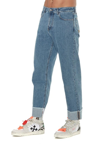 Shop Gcds Folded Cuff Wide Leg Jeans In Blue