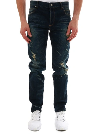 Shop Balmain Distressed Jeans In Blue