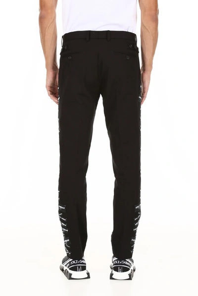 Shop Dolce & Gabbana Side Patchwork Logo Tailored Trousers In Black