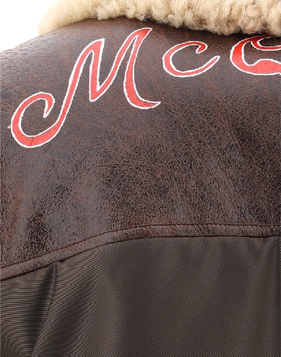 Shop Alexander Mcqueen Logo Embroidered Fur Collared Jacket In Brown
