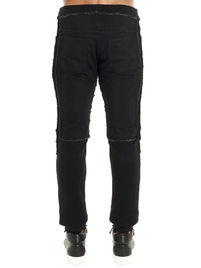 Shop Balmain Distressed Biker Pants In Black