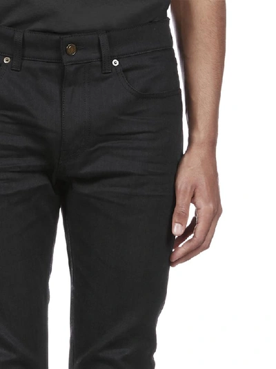 Shop Saint Laurent Skinny Jeans In Black