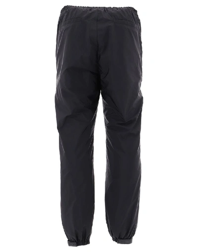 Shop Prada Hybrid Elasticated Cuff Trousers In Black