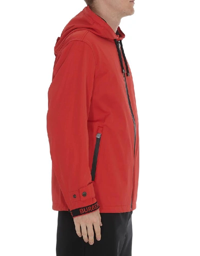 Shop Burberry Hooded Logo Detail Jacket In Red