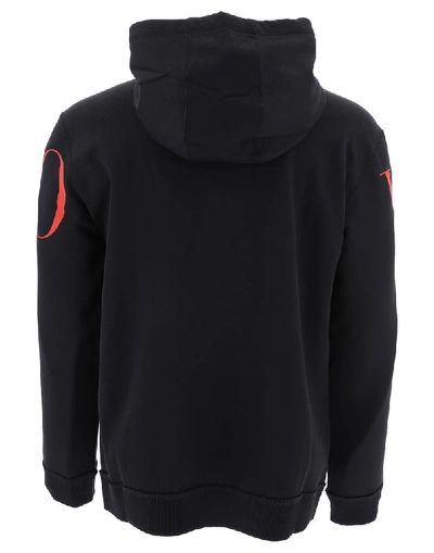 Shop Valentino Logo Printed Hoodie In Black