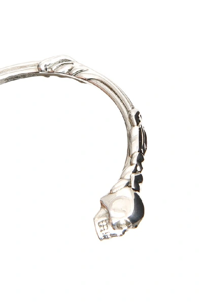 Shop Alexander Mcqueen Twin Skull Logo Engraved Bracelet In Silver