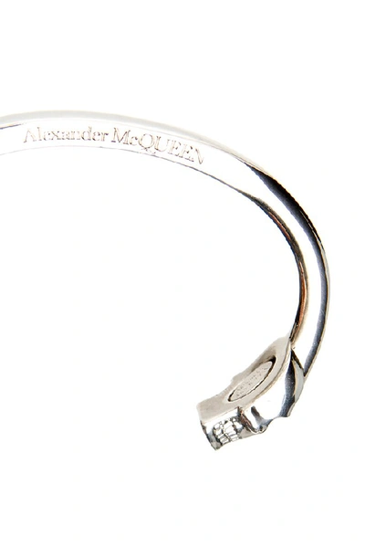 Shop Alexander Mcqueen Skulls Bracelet In Silver