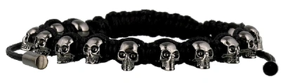 Shop Alexander Mcqueen Skulls Bracelet In Black