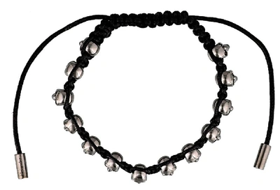 Shop Alexander Mcqueen Skulls Bracelet In Black