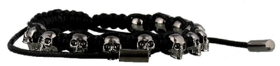 Shop Alexander Mcqueen Skulls Bracelet In Black