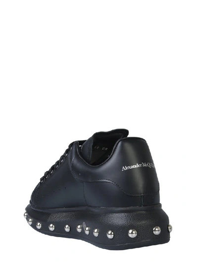 Shop Alexander Mcqueen Studded Sole Sneakers In Black