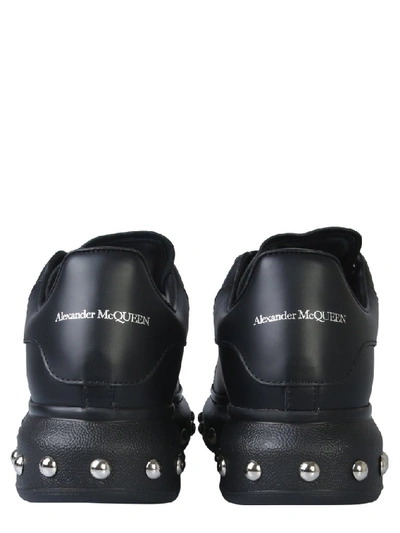 Shop Alexander Mcqueen Studded Sole Sneakers In Black