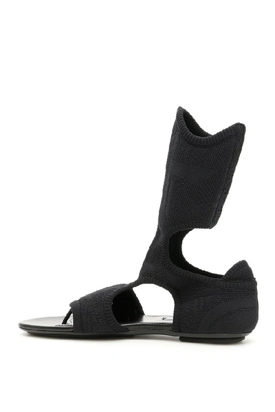 Shop Prada Stretch Sock Sandals In Black