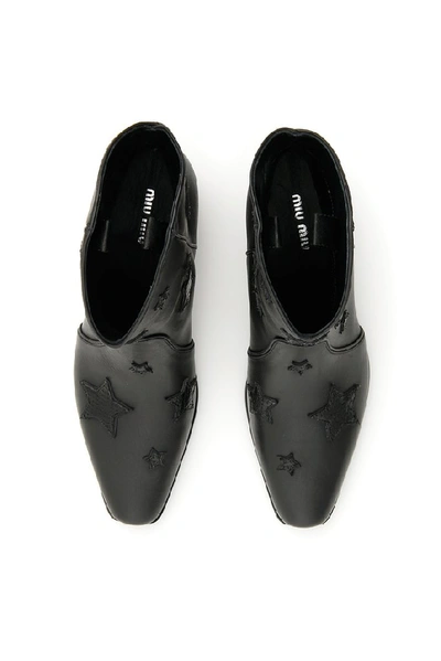 Shop Miu Miu Texan Booties In Black