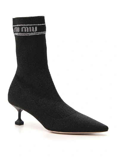 Shop Miu Miu Logo Heeled Sock Boots In Black