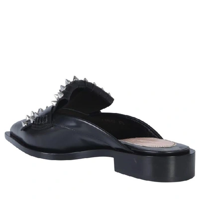 Shop Alexander Mcqueen Kiltie Studded Mules In Black