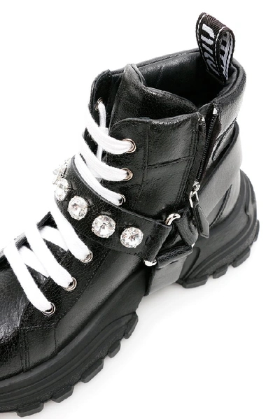 Shop Miu Miu Combat Crystal Embellished Sneakers In Nero