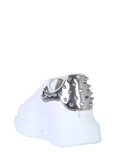 Shop Alexander Mcqueen Studded Oversize Sneakers In White