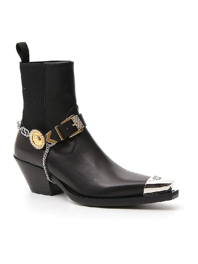 Shop Versace Medusa Buckle Strap Pointed Toe Ankle Boots In Black