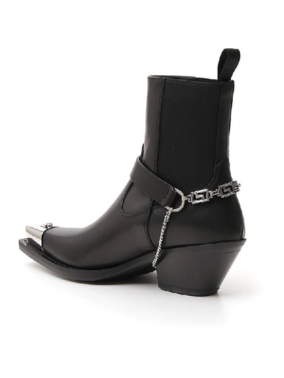 Shop Versace Medusa Buckle Strap Pointed Toe Ankle Boots In Black