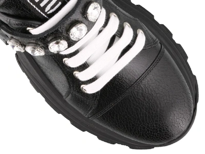 Shop Miu Miu Buckled Low Top Sneakers In Black
