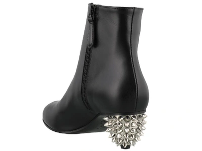 Shop Alexander Mcqueen Studded Heel Ankle Boots In Black