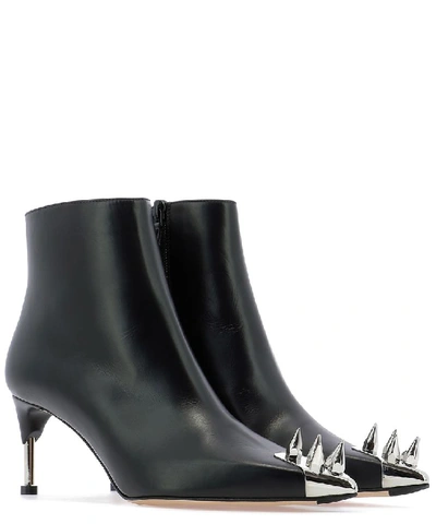 Shop Alexander Mcqueen Studded Ankle Boots In Black