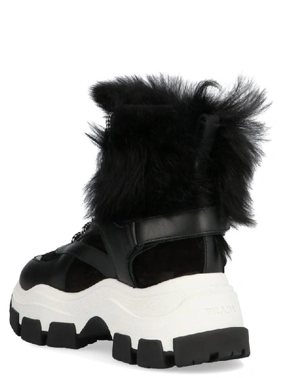 Shop Prada Pegasus Shearling Detail Sneakers In Black