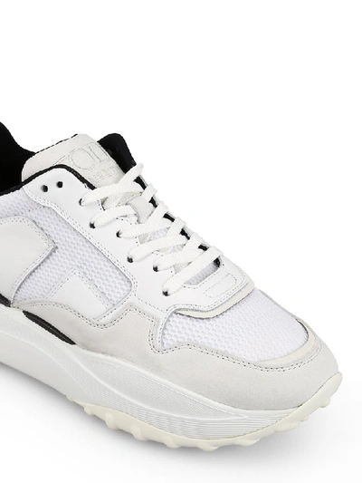 Shop Tod's Low Top Sneakers In White