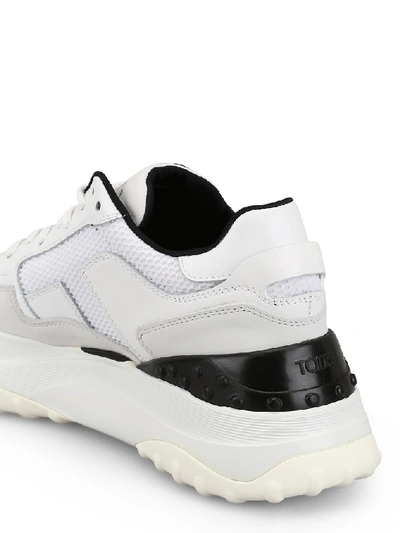 Shop Tod's Low Top Sneakers In White
