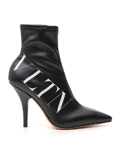 Shop Valentino Vltn Heeled Boots In Black