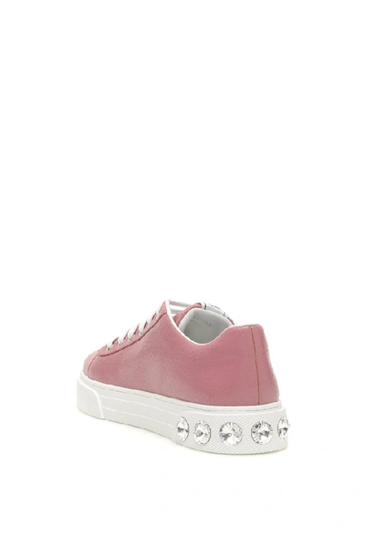 Shop Miu Miu Crystal Embellished Sneakers In Pink