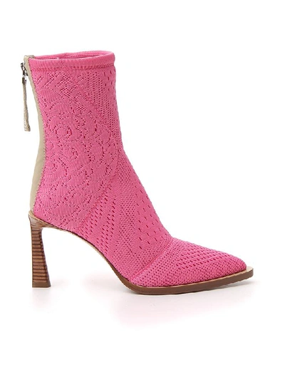 Shop Fendi Tronchetto Pointed Toe Ankle Boots In Pink