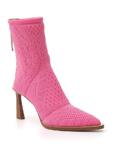 Shop Fendi Tronchetto Pointed Toe Ankle Boots In Pink