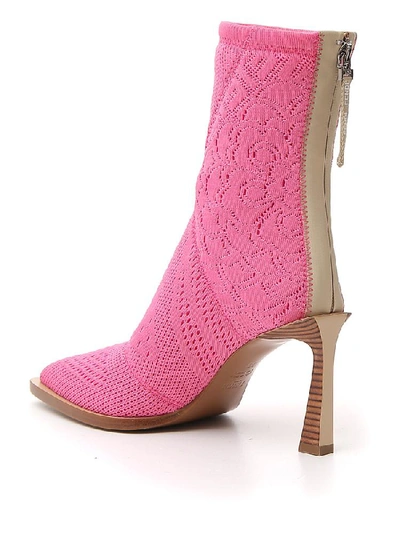 Shop Fendi Tronchetto Pointed Toe Ankle Boots In Pink