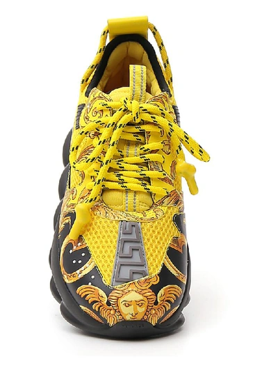 Shop Versace Baroque Printed Chunky Sole Sneakers In Gold Black