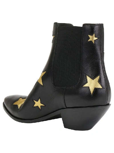 Shop Saint Laurent West Star Ankle Boots In Black