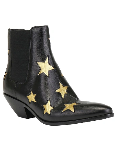 Shop Saint Laurent West Star Ankle Boots In Black