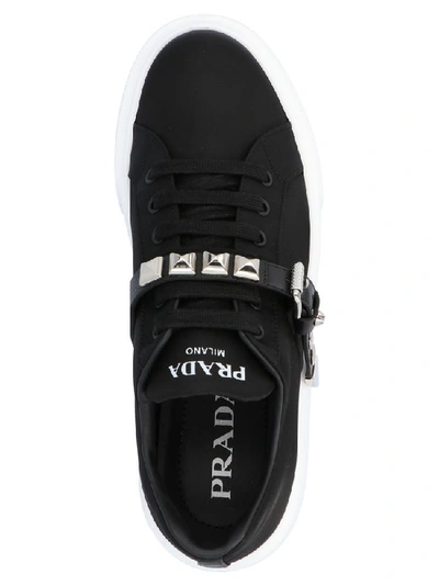 Shop Prada Studded Strap Low Top Sneakers In Black