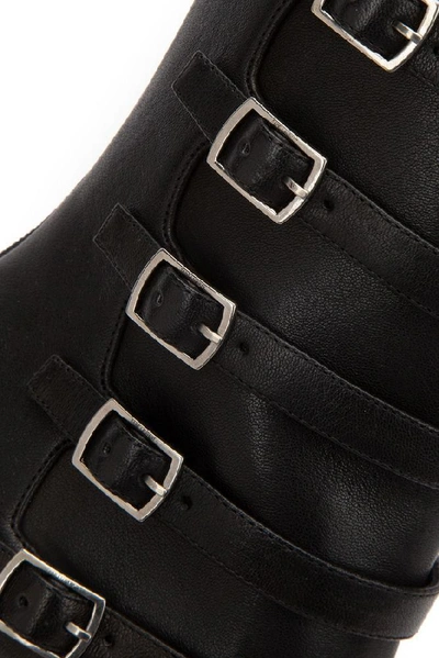 Shop Saint Laurent Lou Buckle Strap Ankle Boots In Black