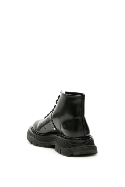 Shop Alexander Mcqueen Lace Up Ankle Boots In Black