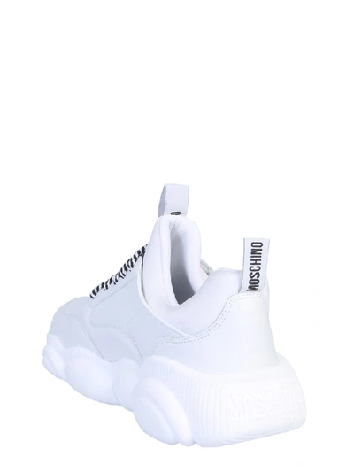 Shop Moschino Teddy Bi Colour Lace Detail Sneakers In White