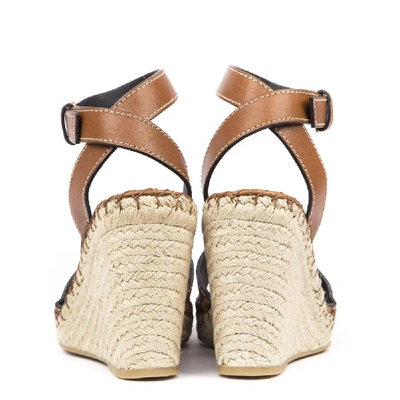 Shop Valentino Garavani Vlogo Wedge Sandals In Brown