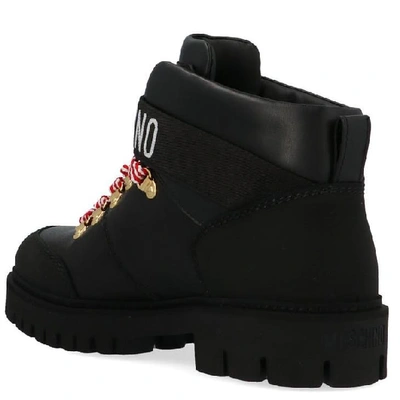 Shop Moschino Logo Buckle Combat Boots In Black