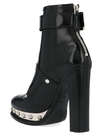 Shop Alexander Mcqueen Studded Buckled Ankle Boots In Black