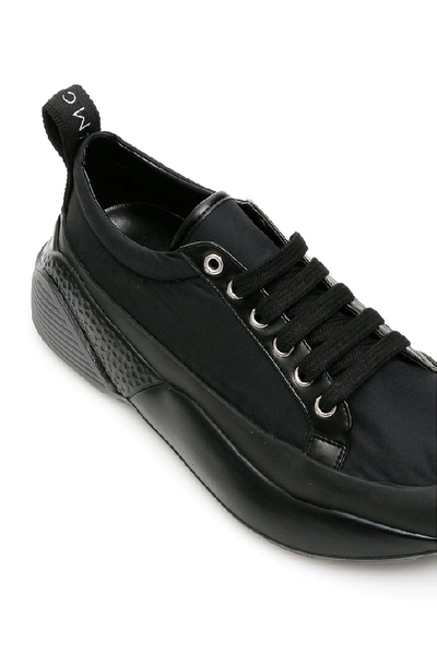 Shop Stella Mccartney Logo Pull Tab Oversized Lace Up Sneakers In Black